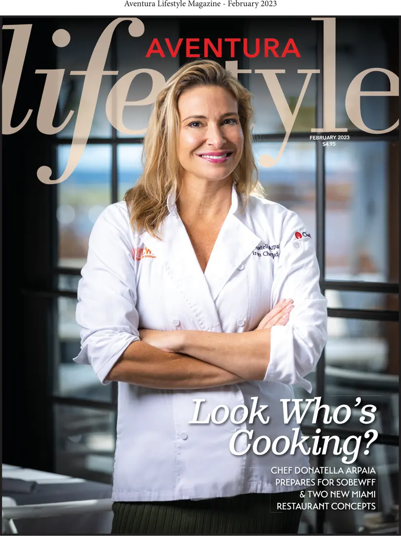 Aventura Lifestyle Magazine’s cover, February 2023: Donatella Arpaia in her chef’s jacket under the line “Look Who’s Cooking?”