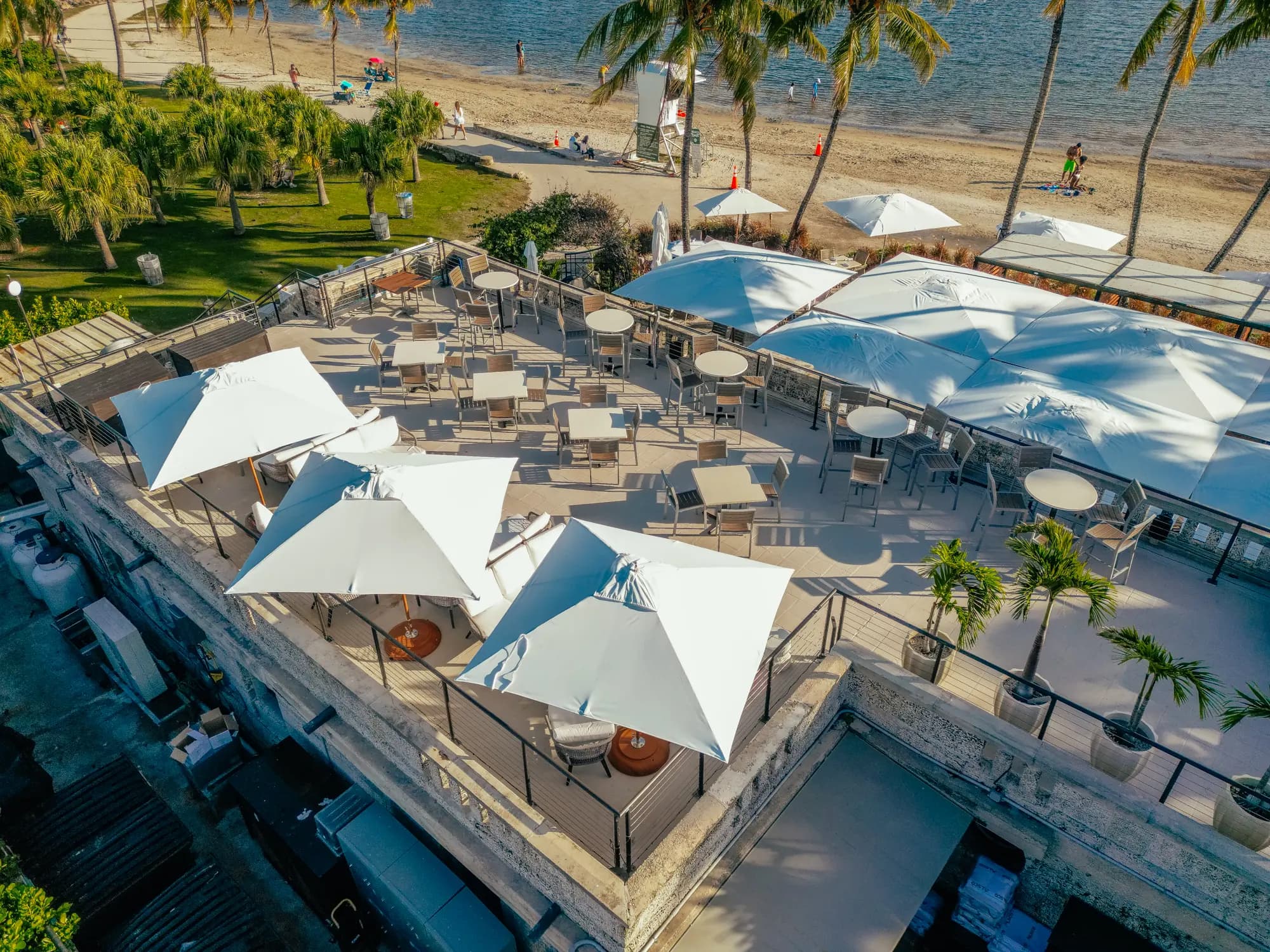 The roof terrace’s white umbrellas from the air